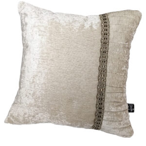 cream cushion with decorative wrinkled edge separated with braid 2 1 1